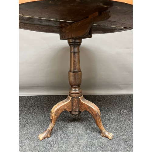 278 - A 17th/ 18th century pedestal oak drop end circular table. Turned pedestal with off swept claw feet.... 