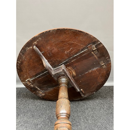 278 - A 17th/ 18th century pedestal oak drop end circular table. Turned pedestal with off swept claw feet.... 