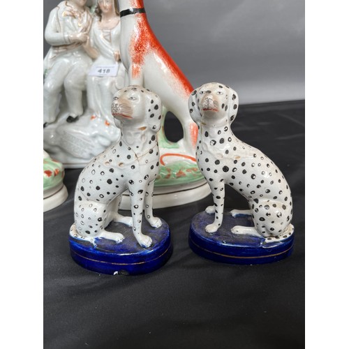 418 - A Collection of antique Staffordshire and possibly Meissen/ derby dog figures. [Some as found]