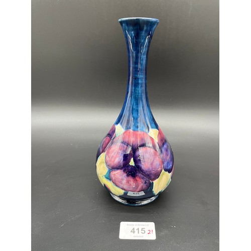 415 - William Moorcroft [1872-1945] bottle neck pansies design vase, C1930. Signed. [21cm high]