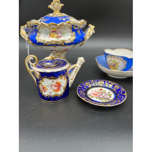 410 - A Meissen hand painted cup and saucer, Hand painted watering can and saucer and a hand painted two h... 