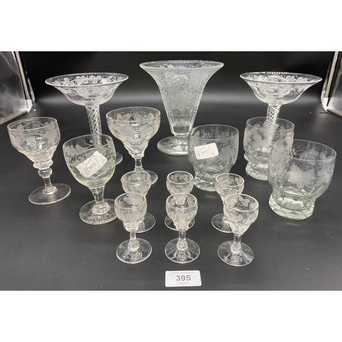 395 - A Collection of antique and vintage crystal etched glasses and vases. Includes two Stuart Crystal tw... 