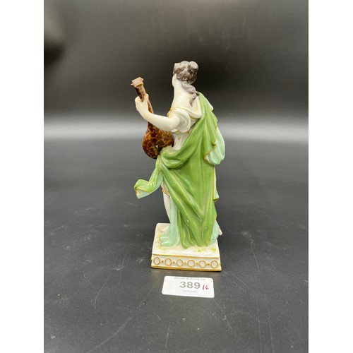 389 - A 19th century Meissen lady figurine playing a mandolin. [16cm high]