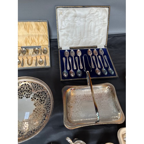 388 - A Collection of Silver plate and E.P Wares to include boxes of cutlery, swing handle baskets, loose ... 