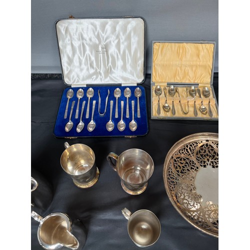 388 - A Collection of Silver plate and E.P Wares to include boxes of cutlery, swing handle baskets, loose ... 