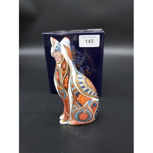 145 - A Royal Crown Derby Siamese cat paperweight, gold button and comes with original box.