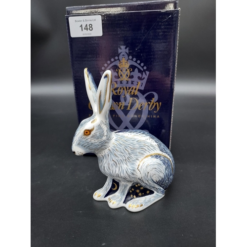 148 - A Royal Crown Derby Starlight Hare- Guild Exclusive. Gold Button and comes with original box.