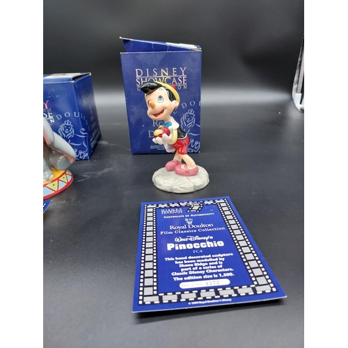 157A - Three Royal Doulton Disney Showcase collection figures. 'Timothy Mouse, Dumbo & Pinocchio' Comes wit... 