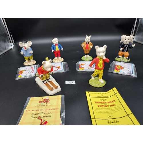 165A - A Lot of six Royal Doulton Rupert Bear figures. Comes with certificates and boxes.