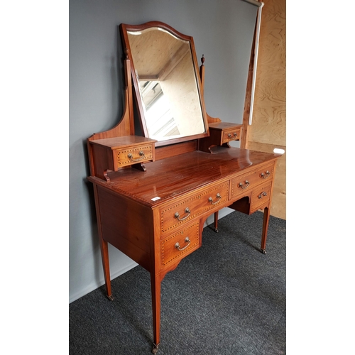 293 - A 19th century knee hole dressing table chest. Fitted with a swivel mirror top and small drawers. Su... 