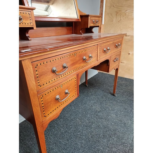 293 - A 19th century knee hole dressing table chest. Fitted with a swivel mirror top and small drawers. Su... 