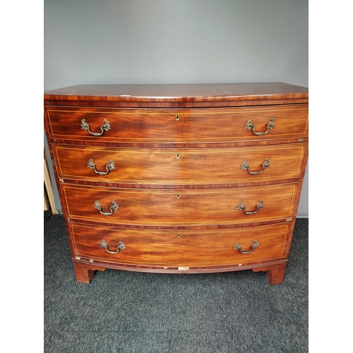 297 - A 19th century bow front four drawer chest. [102x118x62cm]