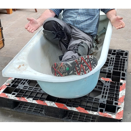 299 - Antique cast metal and enamel bath tub with fitted taps , comes with pedestal legs.