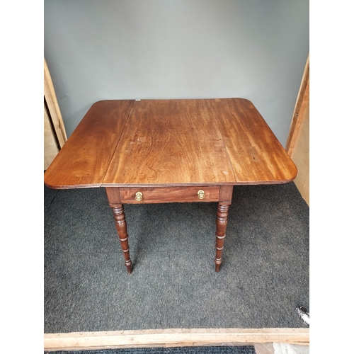 307 - A 19th century Mahogany drop end sofa table, supported on turned legs.