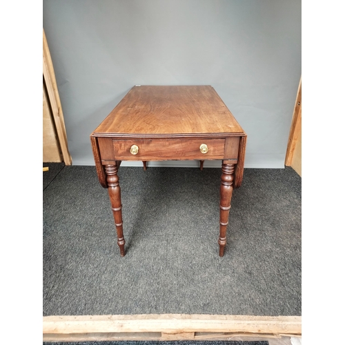 307 - A 19th century Mahogany drop end sofa table, supported on turned legs.