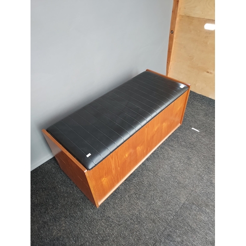 327 - A Mid century teak and faux leather ottoman [48x100x42cm]