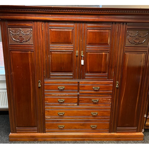 253 - A Victorian Mahogany Compactum Wardrobe late 19th century, The dentil moulded cornice above a centra... 