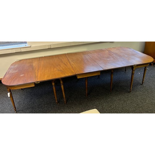 269 - A 19th century large mahogany dining table. [72x300x126cm]