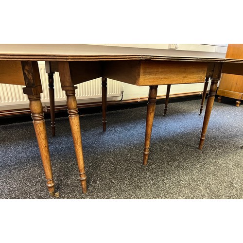 269 - A 19th century large mahogany dining table. [72x300x126cm]