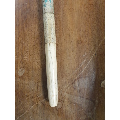 261 - A 19th century bone walking cane with yellow metal top. [As Found] [90cm length]