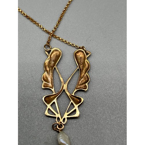 5 - 9ct yellow gold ornate pendant set with a single pearl attached with a 9ct yellow gold necklace. [4.... 