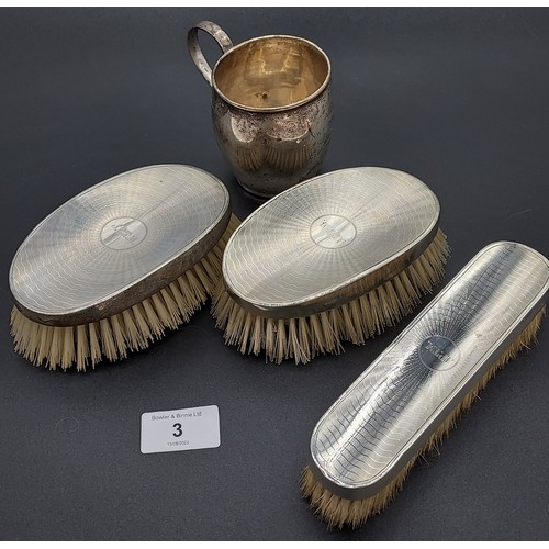 3 - Three silver marked hand brushes together with a London silver Christening mug. [All engraved] [Will... 