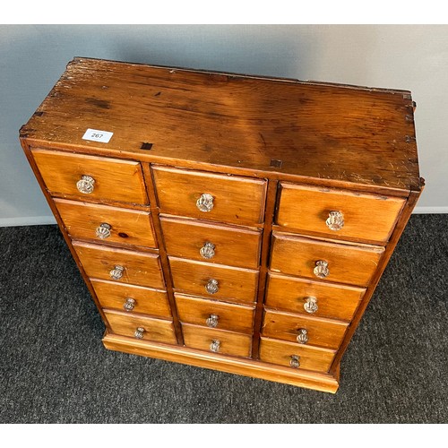 267 - Stripped pine apothecary unit, an arrangement of 15 drawers raised on a plinth base [70x55x20cm]