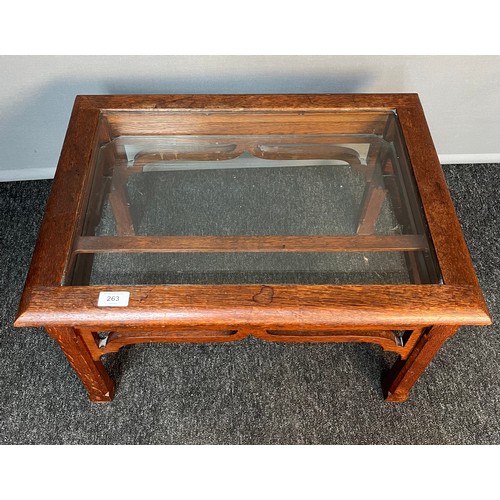 263 - 19th century oak glass table, the lift-up top held up by a bracket with a glass shelf base above a s... 