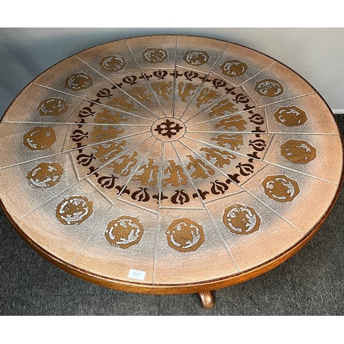 251 - Danish mid century table, the circular surface with tiled top raised on quad legs [56x107cm]