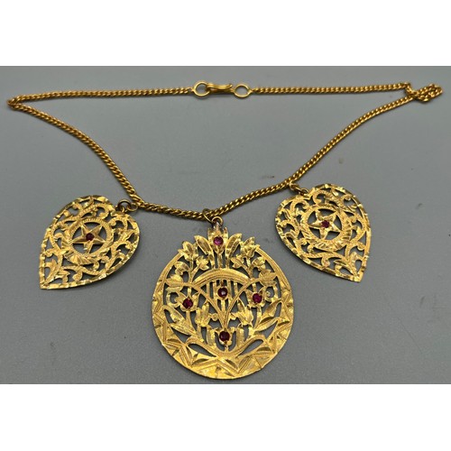 21 - Two ornate Indian 24ct yellow gold dress/ ceremonial  necklaces, decorated with pearls, ruby and whi... 