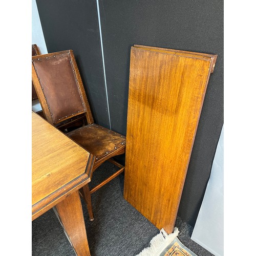 273 - Wylie & Lochhead Glasgow extending wind out dining table, carver and four matching chairs. Comes wit... 