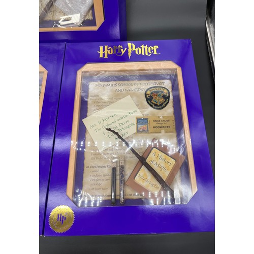 382 - Three 'The Magic Cauldron Company' Limited Edition wall hanging Harry Potter display cabinets contai... 