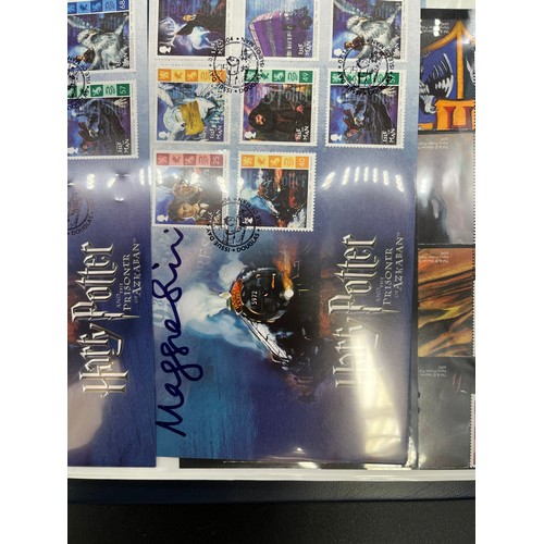 379 - Large album containing signed First day covers and stamps. Signed by John Hurt- Garrick Ollivander, ... 