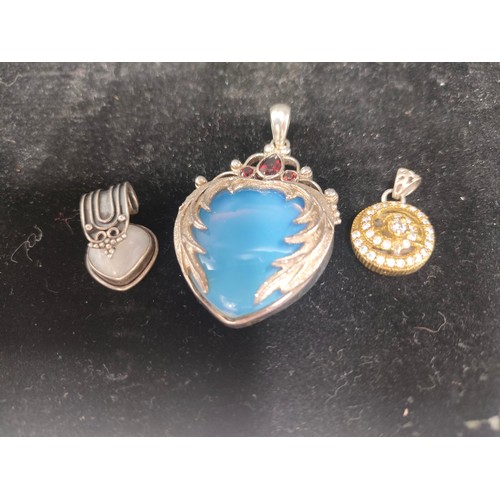 4 - Three various silver pendants. [Will post]