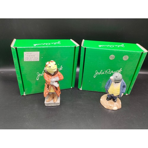 103 - Beswick wind and the willows wiw toad figure together with beswick mile figure .