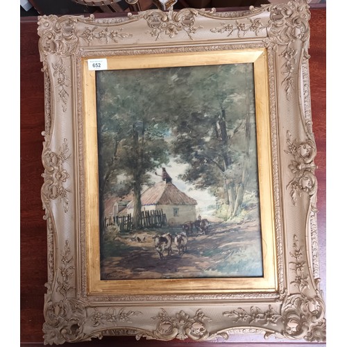 652 - Watercolour depicting cattle/ farm scene, in a decorative frame,  Signed[61x53cm]