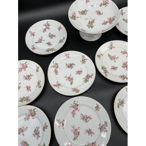 175 - A set of twelve 19th century English tea plates and tazza. Showing a pink flower design. [Some as fo... 