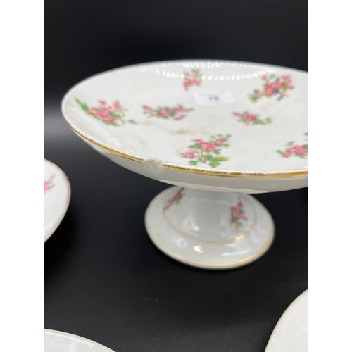 175 - A set of twelve 19th century English tea plates and tazza. Showing a pink flower design. [Some as fo... 