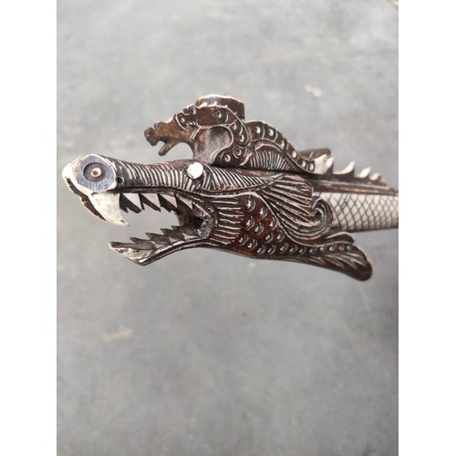 69 - Chinese hand carved dragon dart blower. [Will not post]