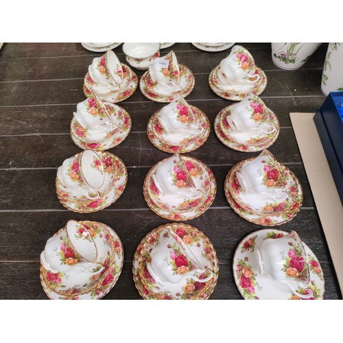 148 - Large Royal Albert old country roses tea service with sugar dish.