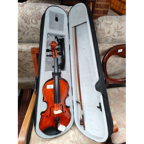 202 - Violin with bow in fitted case .