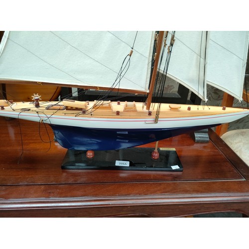 206a - Large model sailing boat on stand.