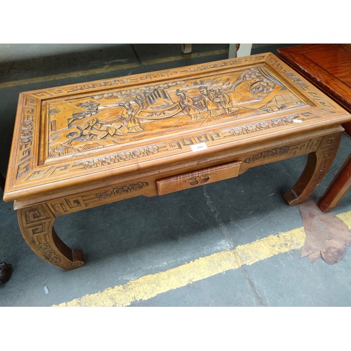 208 - Oriental Carved coffee table with drawer .