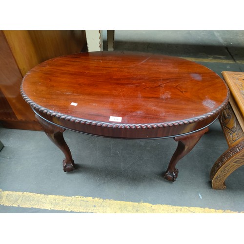 209 - Vintage ball and claw footed table .