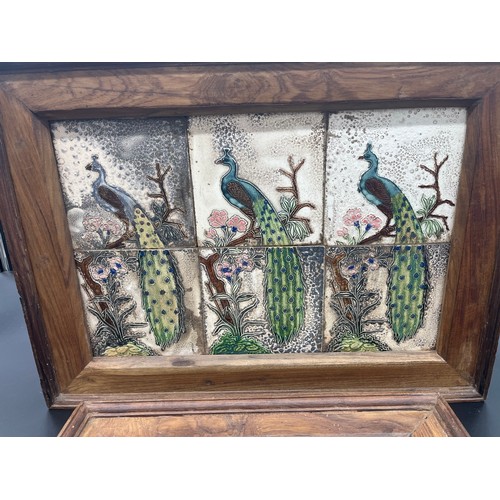 586 - Two sets of Framed Majolica peacock design tiles. Fitted within rustic pine frames. [Large-41x56cm]