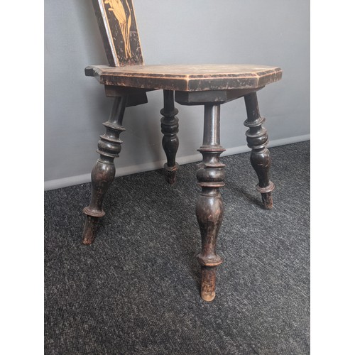 773 - 19th century poker work spinning chair, raised on turned legs (95cm)