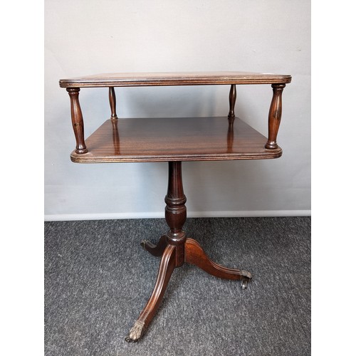 778 - Mahogany leather top table with undertier, raised on outswept legs ending in brass cap feet  (62x40c... 