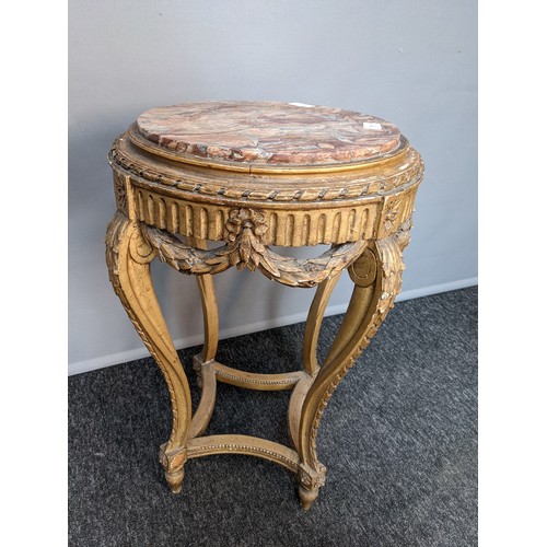 787 - Neo classical style stand, the circular marble top above a moulded carved frieze, raised on carved c... 