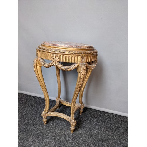 787 - Neo classical style stand, the circular marble top above a moulded carved frieze, raised on carved c... 