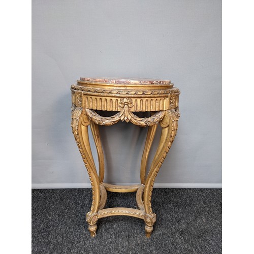 787 - Neo classical style stand, the circular marble top above a moulded carved frieze, raised on carved c... 